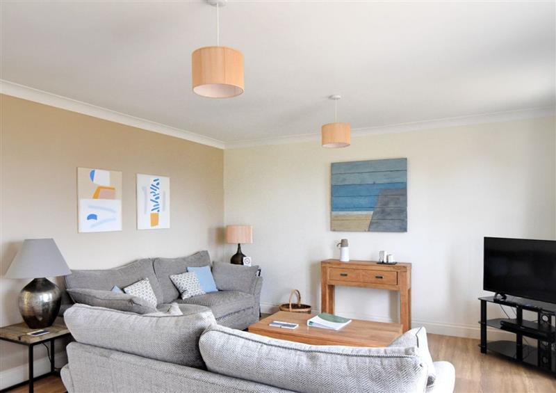 Relax in the living area at 7 Coram Court, Lyme Regis