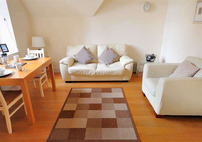 Relax in the living area at 7 Coram Tower, Lyme Regis