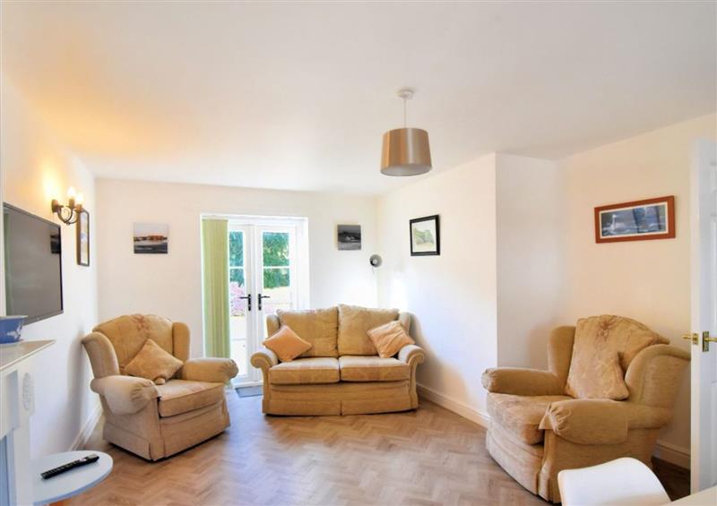 Relax in the living area at 7 Double Common, Charmouth
