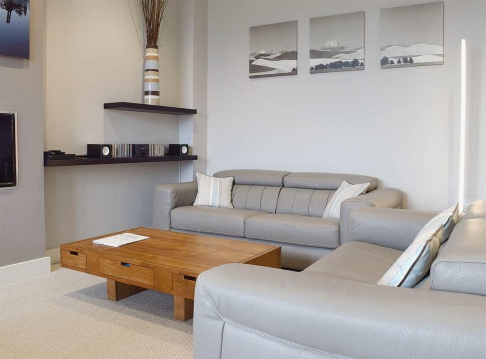 Cosy open plan living space at 7 Ladstock Hall (deluxe) in Keswick, Cumbria