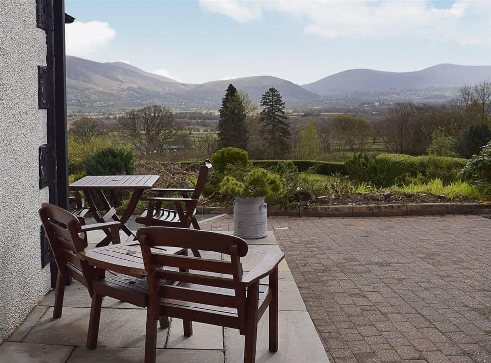 The slated pastio area is slightly raied to take advantage of the wonderful views at 7 Ladstock Hall (deluxe) in Keswick, Cumbria