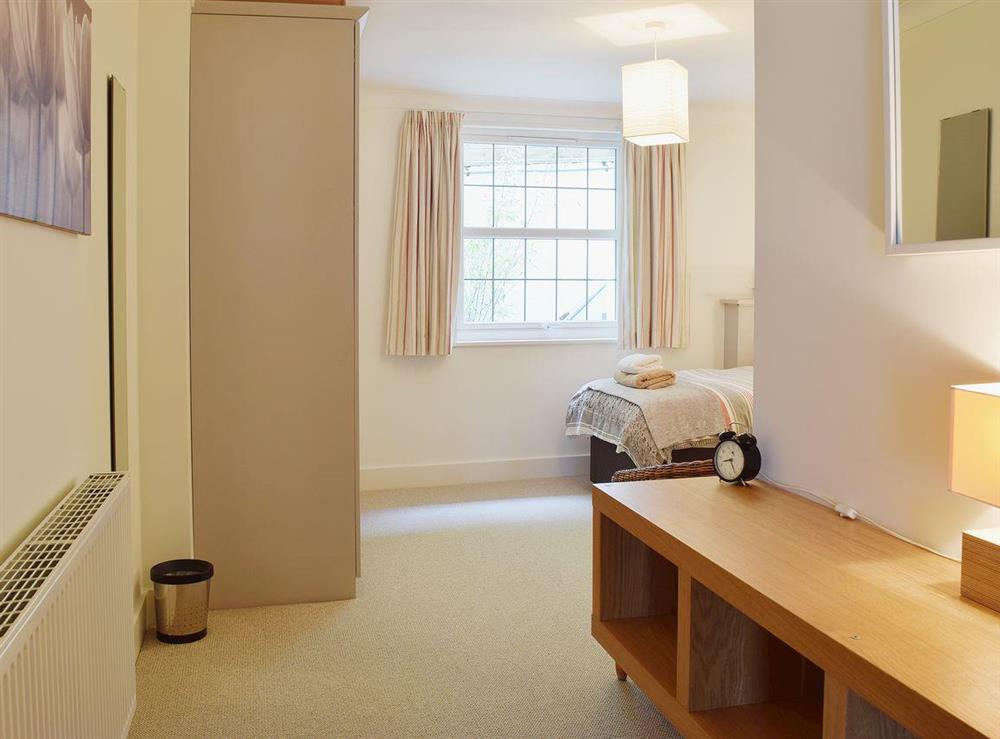 The twin bedded room is spacious at 7 Ladstock Hall (deluxe) in Keswick, Cumbria