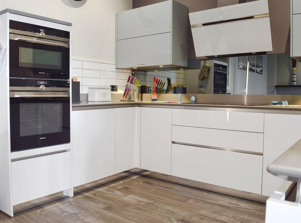 Well equipped kitchen area at 7 Ladstock Hall (deluxe) in Keswick, Cumbria