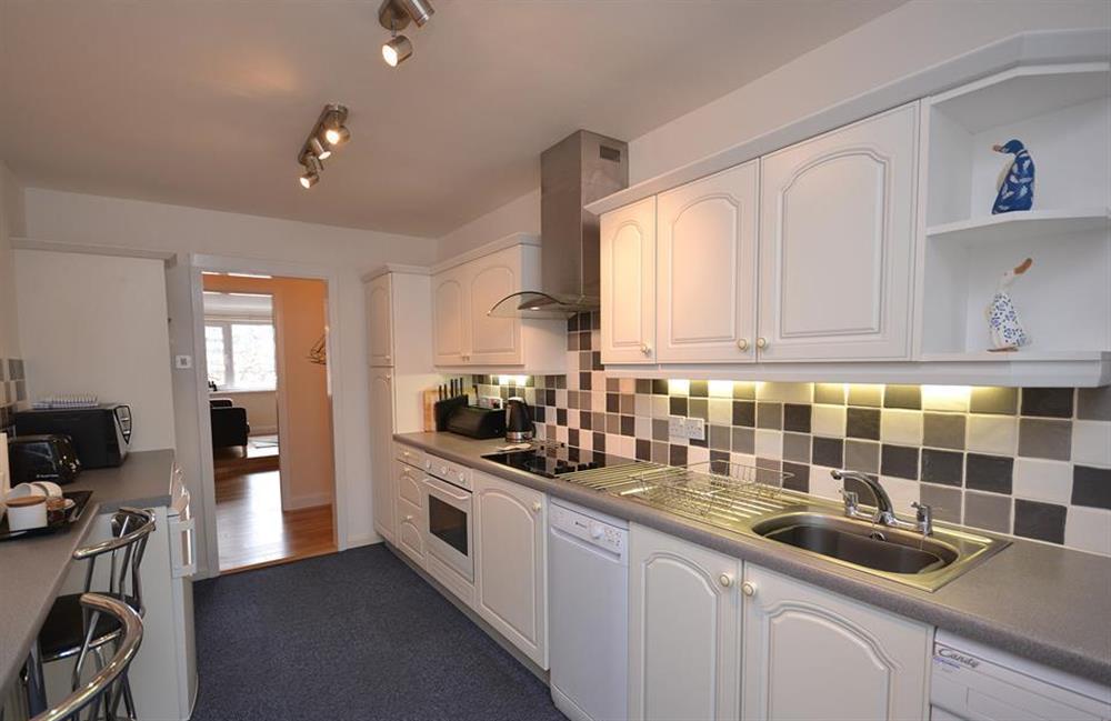 The kitchen also has a breakfast bar at 7 Mayflower Court, Dartmouth