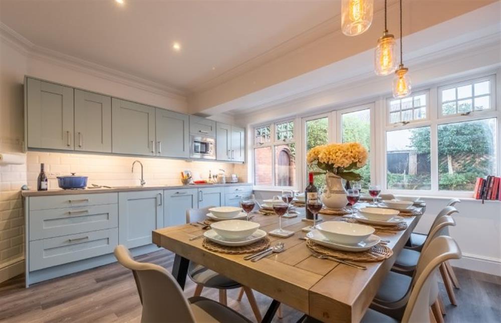 Ground floor: Kitchen/ dining room with a dining table with seating for ten guests  at 7 Montague Road, Sheringham