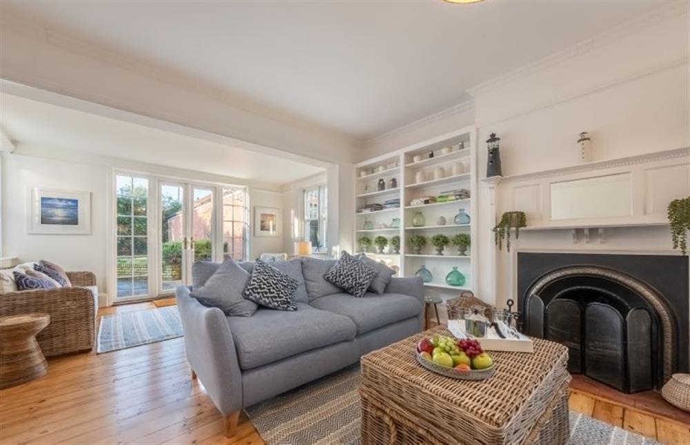 Ground floor: Sitting room with french doors leading to the garden at 7 Montague Road, Sheringham