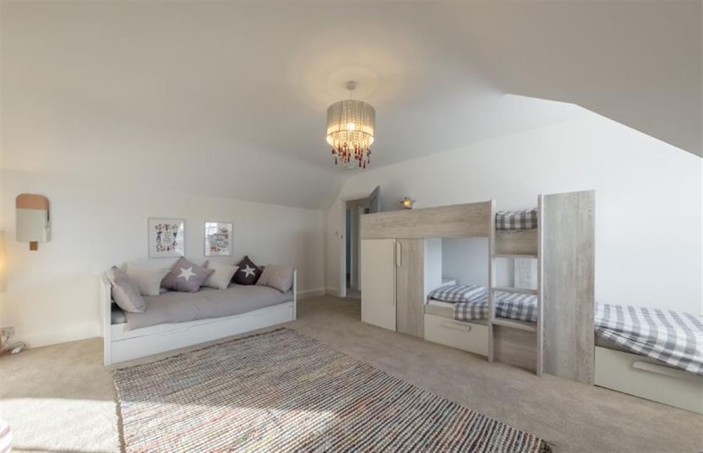 Second floor: Bedroom three, the bunk room overlooking the golf course at 7 Montague Road, Sheringham