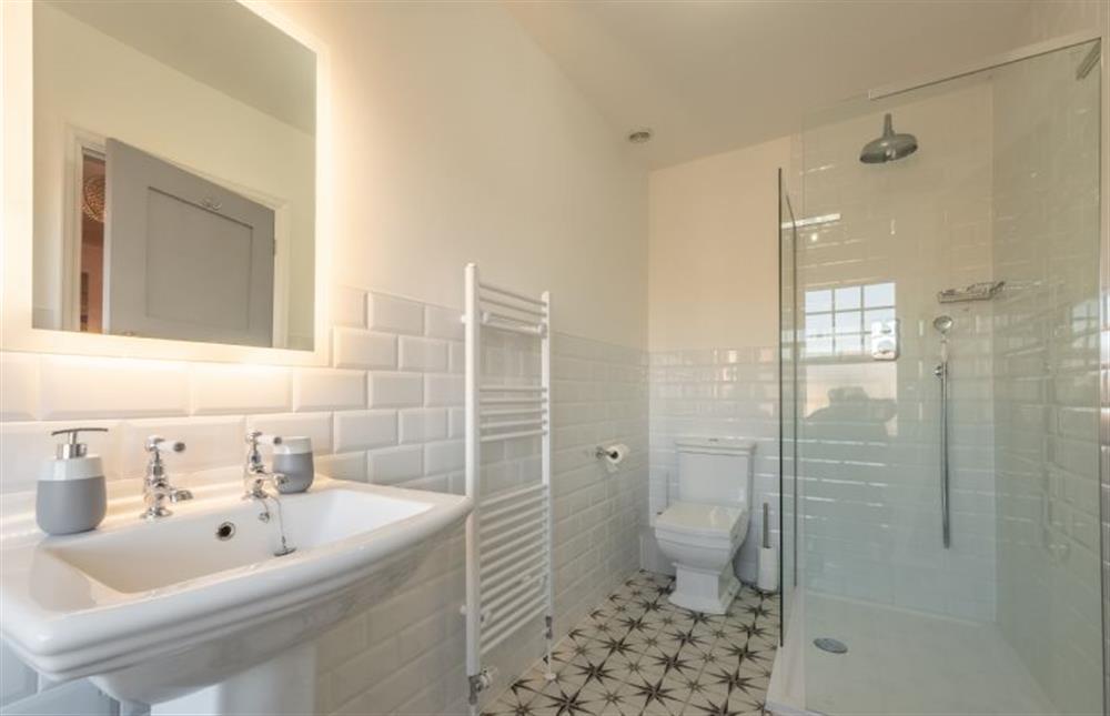 Second floor: En-suite with rain forest shower, WC and wash basin at 7 Montague Road, Sheringham