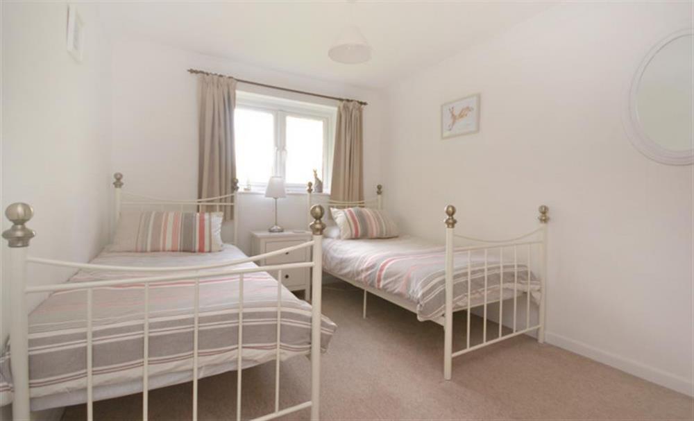 Friends or siblings will be comfortable in this bedroom with views over the fields at the rear of the property. at 7 Primrose in Chillington