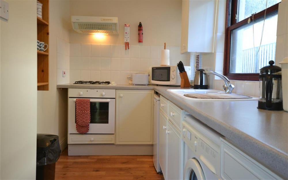 The practical kitchen, Please note NO washing machine but now a dishwasher. at 7 Rock Towers in Looe