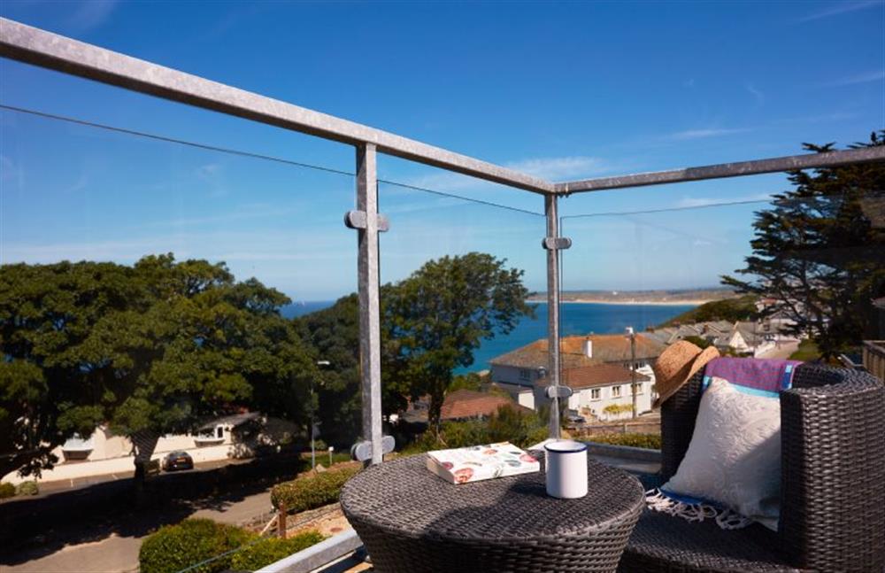 Balcony with lounge seating accompanied by beautiful sea views at 7 Sandy Lane, Carbis Bay 