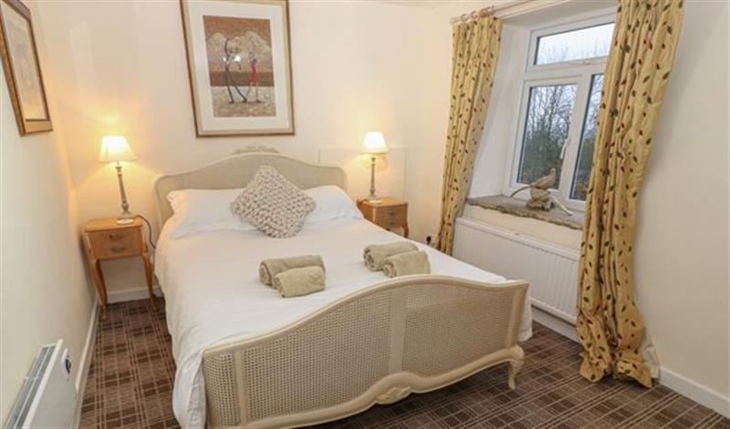 A bedroom in 7 Scarah Bank Cottages at 7 Scarah Bank Cottages, Ripley