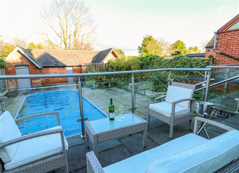 Enjoy the swimming pool at 7 The Village, West Hallam near Stanley