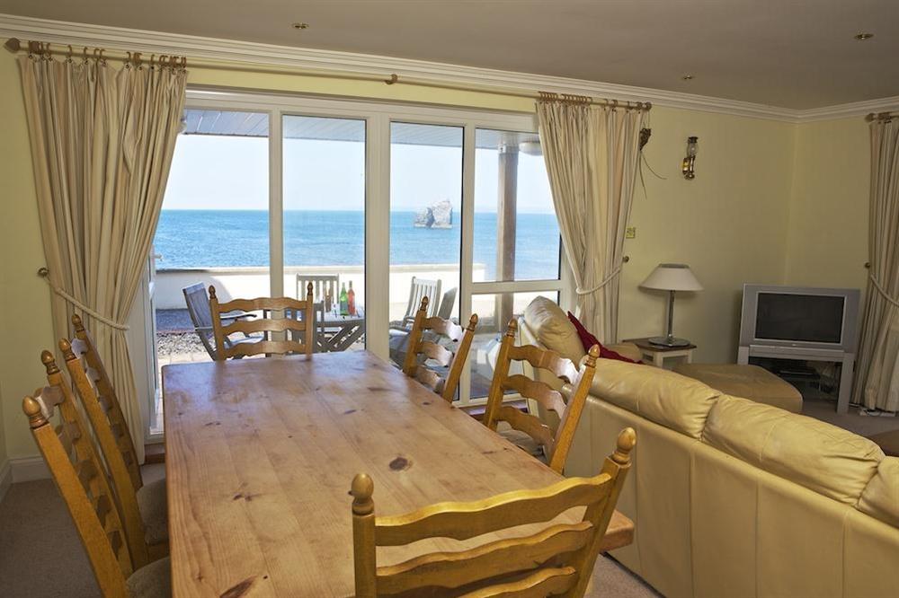 A large comfortable living/dining room with beautiful sea views at 7 Thurlestone Rock Apartments in , Kingsbridge