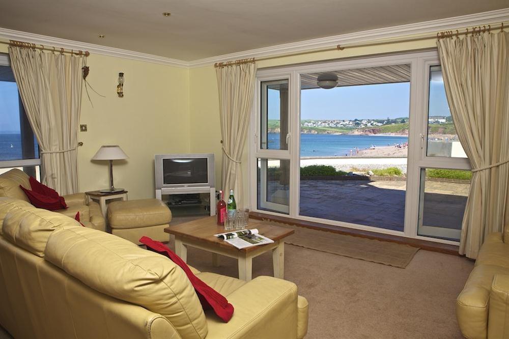 A large comfortable living room with beautiful sea views at 7 Thurlestone Rock Apartments in , Kingsbridge