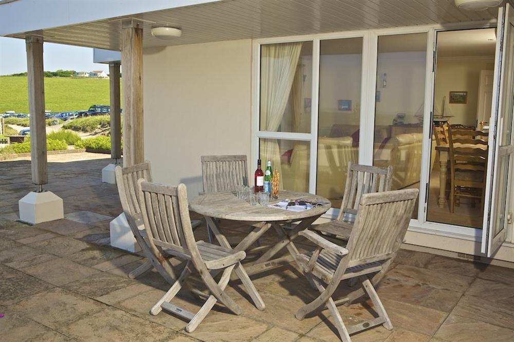 Large patio area accessed directly from lounge with clear views over beach and out to sea at 7 Thurlestone Rock Apartments in , Kingsbridge
