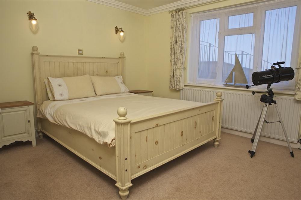 Master bedroom with king size bed at 7 Thurlestone Rock Apartments in , Kingsbridge