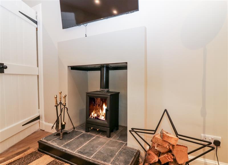 Relax in the living area at 8 Barney Mains Cottage, Haddington