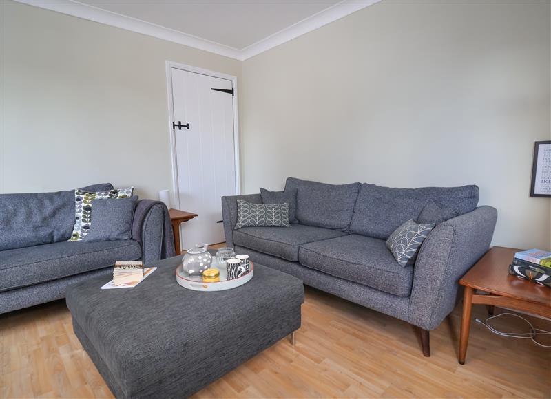 Relax in the living area at 8 Biddlecombe Orchard, Bridport