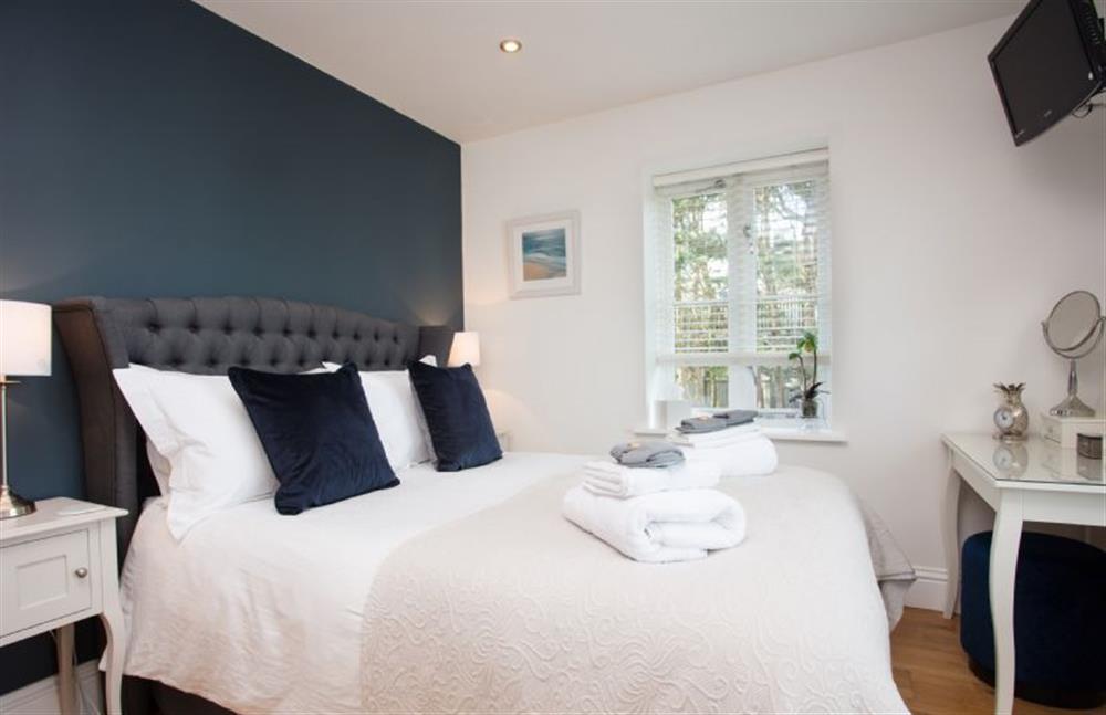 Bedroom one with a 4’6 double bed at 8 Fernhill, Carbis Bay