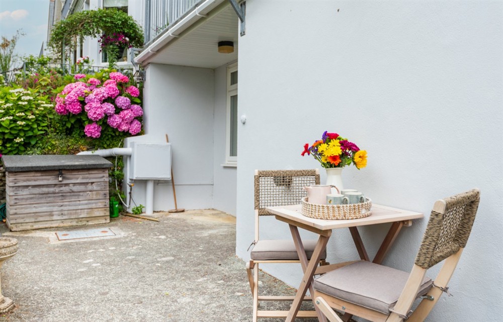 Enjoy a glass of wine on the patio at 8 Melbury in Salcombe