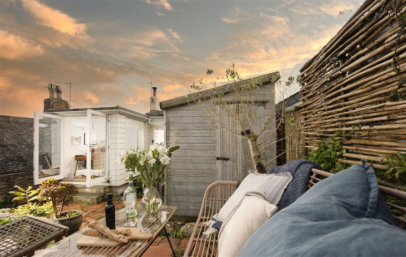 Enjoy a cup of tea on the patio at 8 Millpool, Cornwall