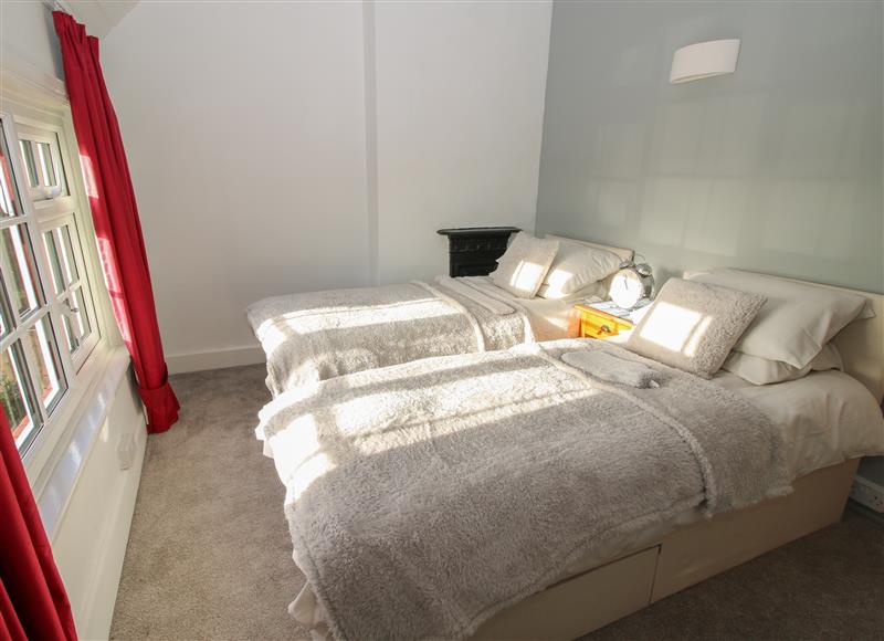 A bedroom in 8 New Houses (photo 2) at 8 New Houses, Pentre near Chirk