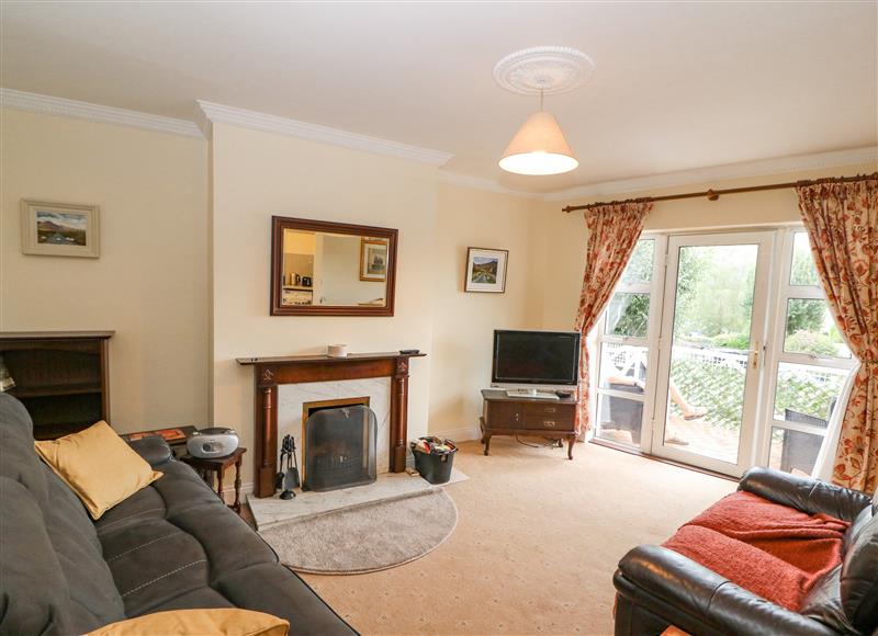 Relax in the living area at 8 Scrahan Place, Killarney