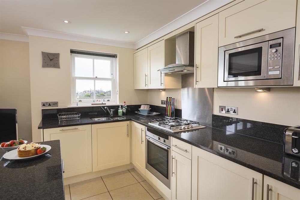 Lovely fitted kitchen with granite worktops and Neff appliances (photo 2) at 8 Thurlestone Beach Apartments in Thurlestone, Nr Kingsbridge