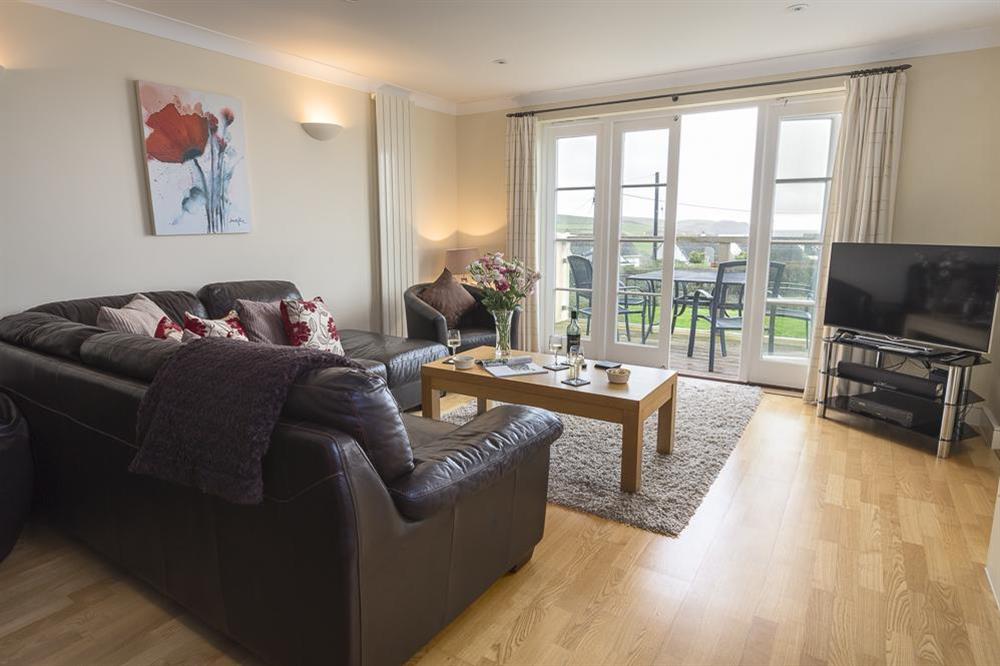Spacious and bright living area with L shaped sofa at 8 Thurlestone Beach Apartments in Thurlestone, Nr Kingsbridge