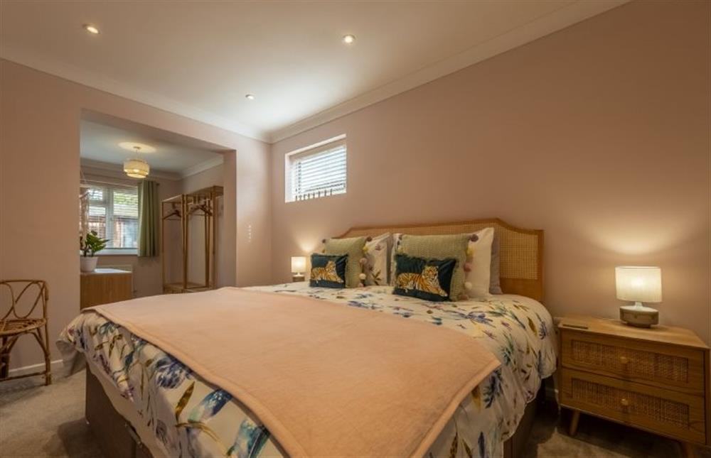 Master bedroom with a super-king bed at 8 Town Close, Holt