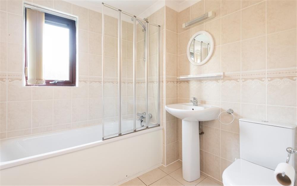 The family bathroom is located upstairs and has the benefit of an additional shower over the bath. at 88 Keepers Barn in Maenporth
