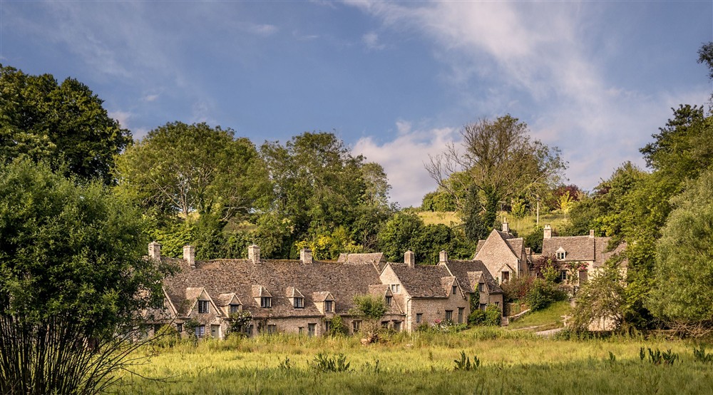 Arlington Row from across the water meadow, Gloucestershire at 9 Arlington Row in Cirencester, Gloucestershire