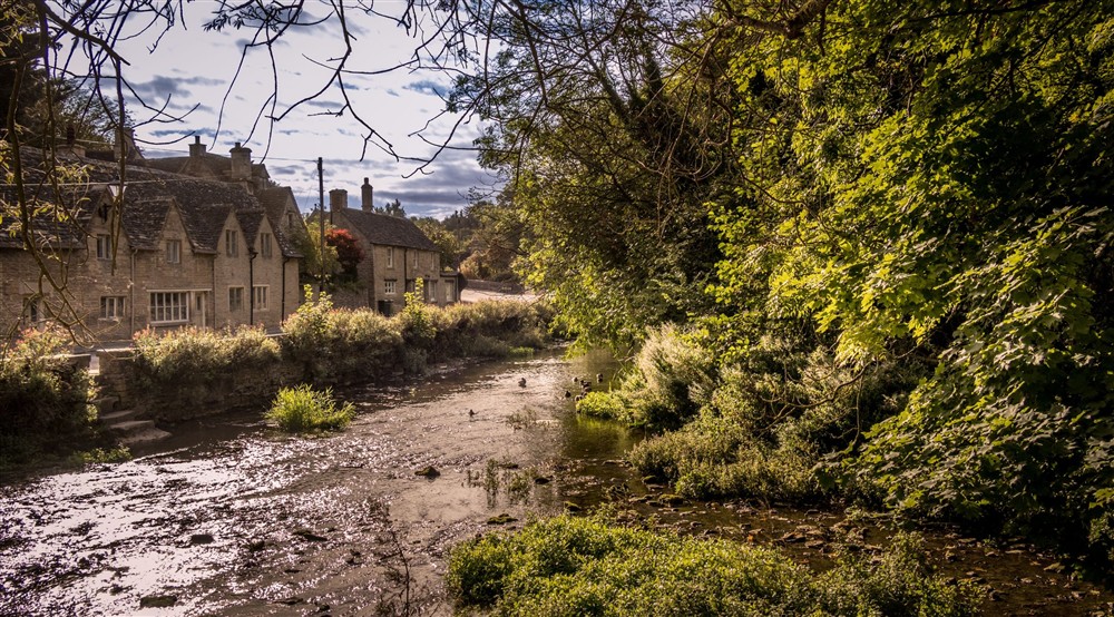 Bibury and the River Coln, near 1 Arlington Row, Gloucestershire at 9 Arlington Row in Cirencester, Gloucestershire