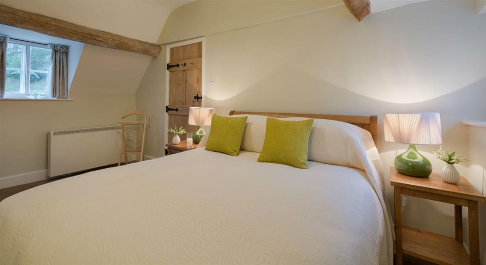 The large double bedroom at 9 Arlington Row in Cirencester, Gloucestershire