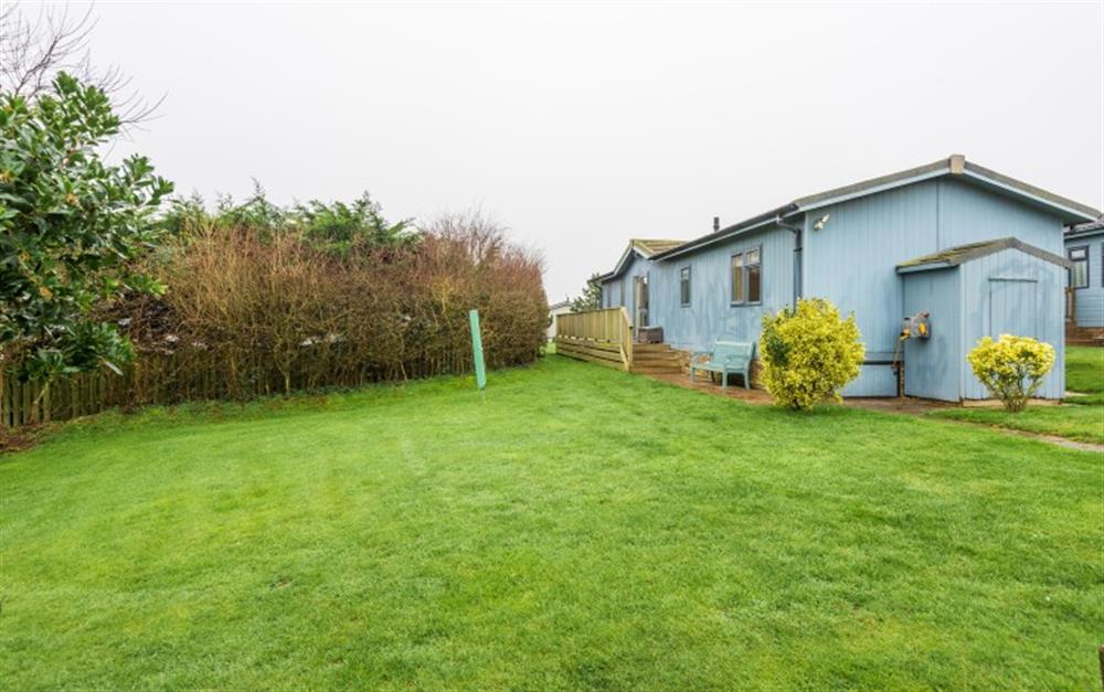 Extensive lawned area immediately next to the lodge. Perfect for the children. at 9 Salcombe Retreat in Soar