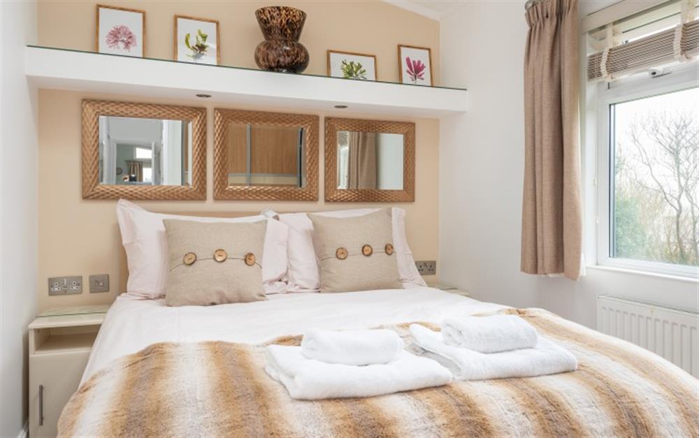 Master bedroom with King size bed. at 9 Salcombe Retreat in Soar