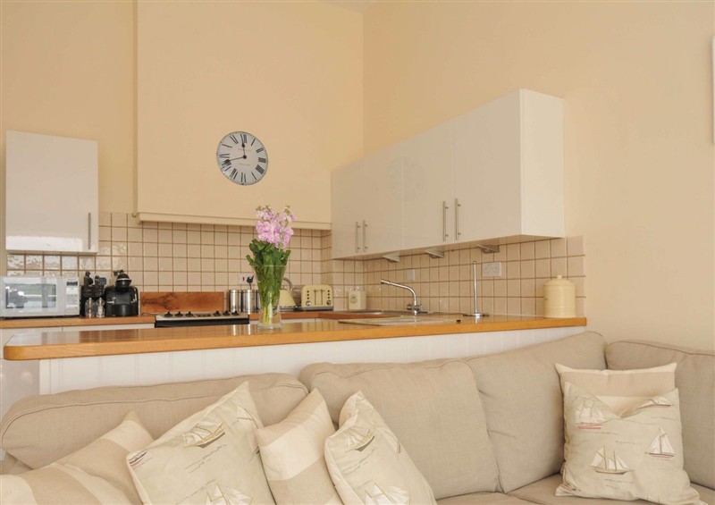 Relax in the living area at 9 Slipway Cottages, Rock