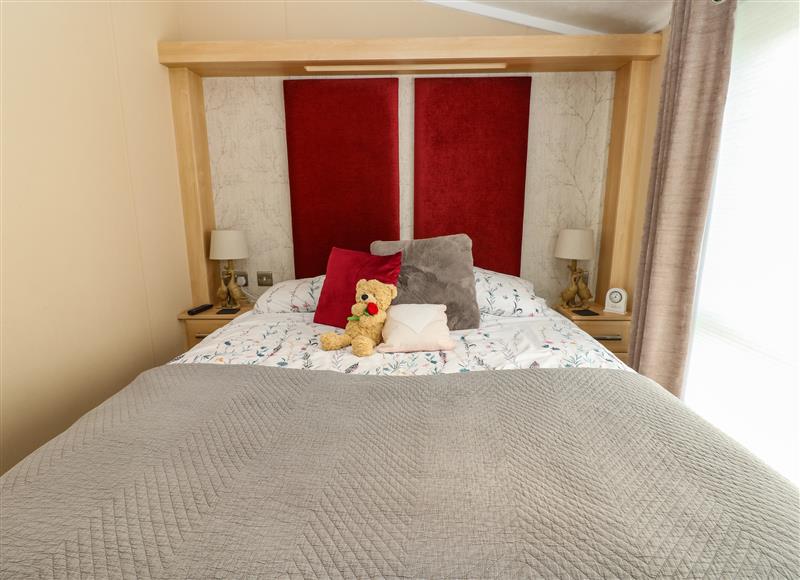 One of the 2 bedrooms at A and C Lodge, Hesket Caravan Park near Armathwaite