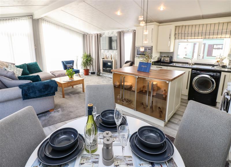 Relax in the living area at A and C Lodge, Hesket Caravan Park near Armathwaite