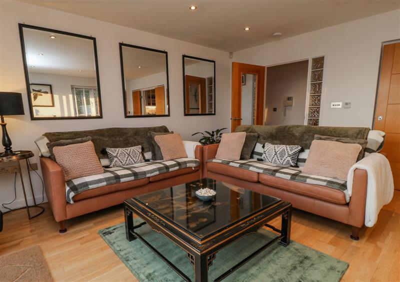 Relax in the living area at A Stones Throw, Downderry