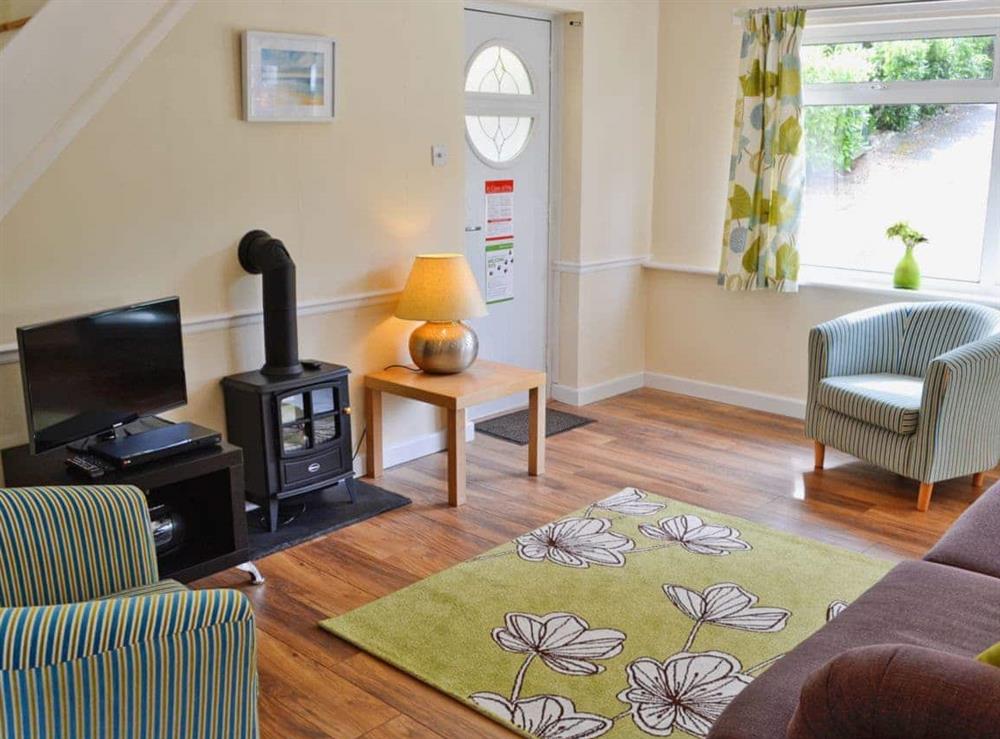 Open plan living/dining room/kitchen at A Twist of Lyme in Raymond’s Hill, near Lyme Regis, Devon