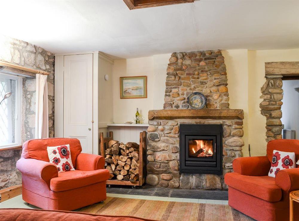 Warm and cosy living room at A Wee Gem in Dunphail, near Forres, Morayshire