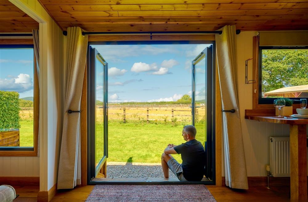 The double doors overlooking the countryside view