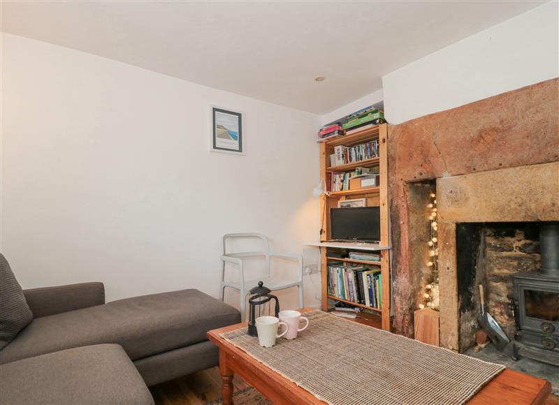 Relax in the living area at Abbey Cottage Montacute, Montacute