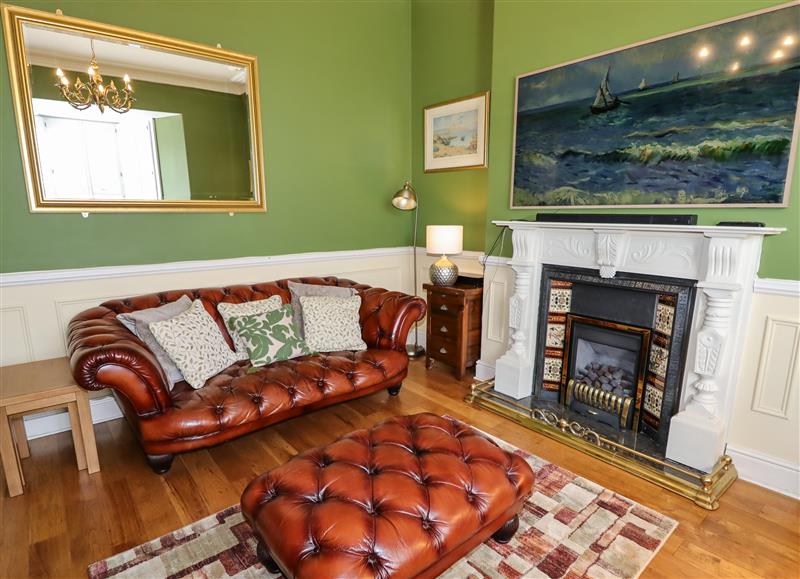 Relax in the living area at Abbey Lodge, Llandudno