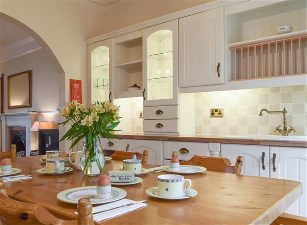 Convenient dining area with the well-equipped kitchen at Abbie House in St Monans, Fife