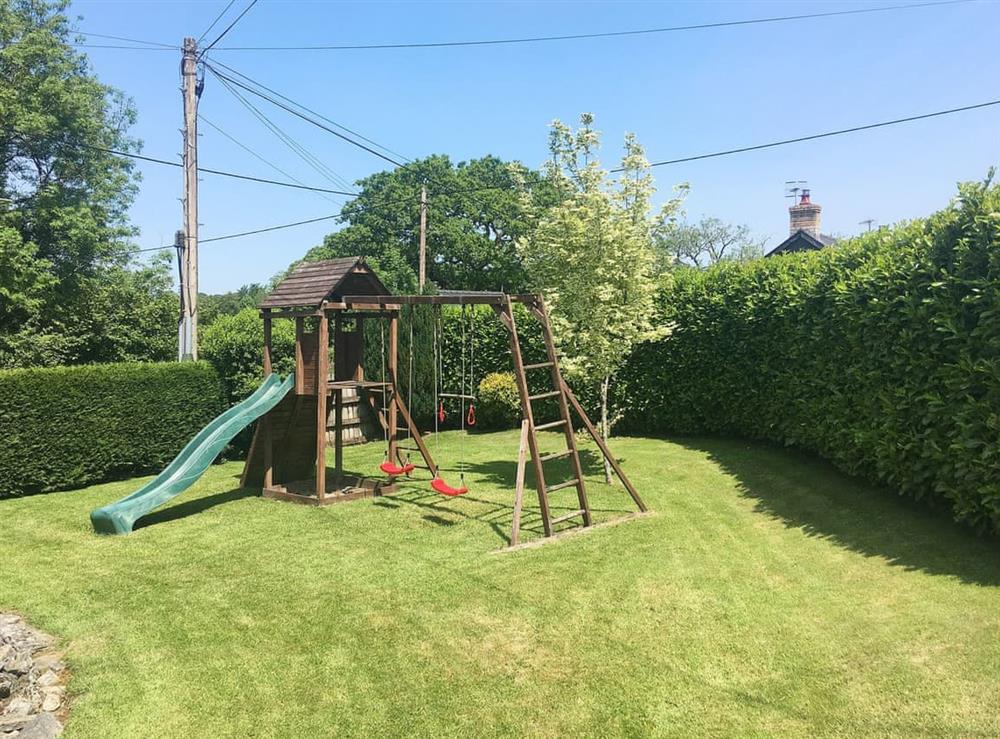 Children’s play area at Abercyros Cottage in Llangammarch Wells, Powys