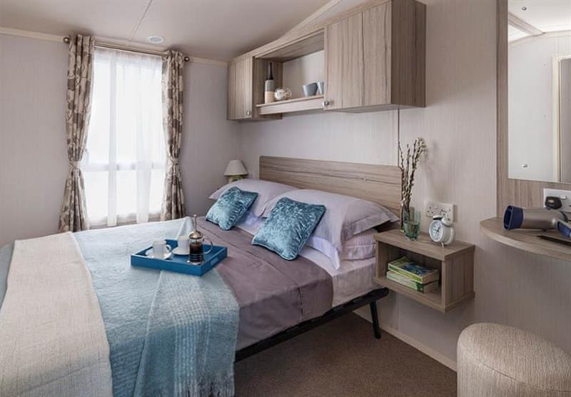 Double bedroom in the Premium Riverside View 2 at Aberdwylan Holiday Park in Carmarthenshire, South Wales