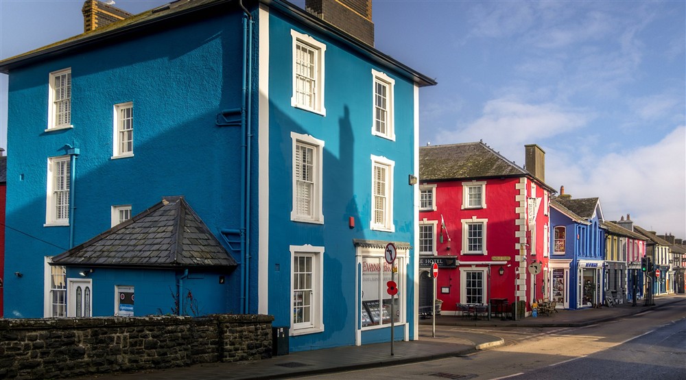 Georgian style buildings in seaside town of Aberaeron, painted bright reds and blues, a 10-minute drive from Abermydyr and Pontbrenmydyr cottages, Ceredigion at Abermydyr in Aberaeron, Ceredigion